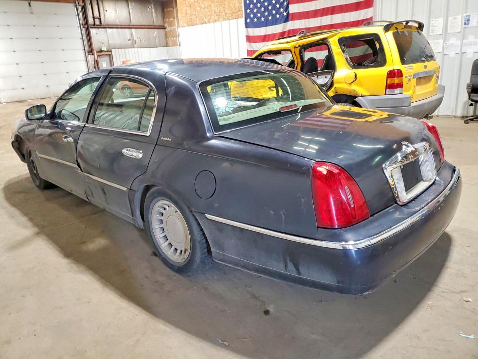 2000 Lincoln Towncar VIN 1LNHM81W2YY894293 COPART salvage auction — SIDE, Ak - Certificate Of Vehicle Title, sold $20 on 2026-07-28 (photo 2)
