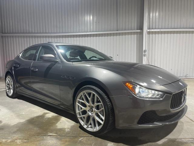 2017 Maserati Ghibli VIN ZAM57XSA9H1206127 COPART salvage auction — NORMAL WEAR, TX - CERT OF TITLE-REBUILT SALVAGE (P), sold $22,300 on 2024-07-10 (photo 1)