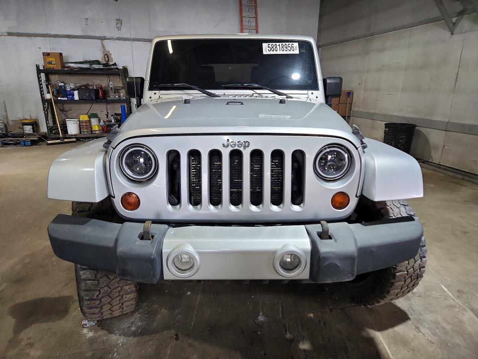 2012 Jeep Wrangler / VIN 1C4BJWEG6CL166928 COPART salvage auction — MECHANICAL, Mi - Certificate Of Title, sold $1,650 on 2026-07-10 (photo 5)