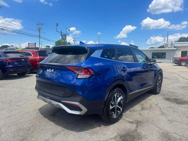 2023 Kia Sportage VIN 5XYK33AF8PG036124 COPART salvage auction — NORMAL WEAR, NY - CERTIFICATE OF TITLE (P), sold $11,900 on 2026-07-04 (photo 4)
