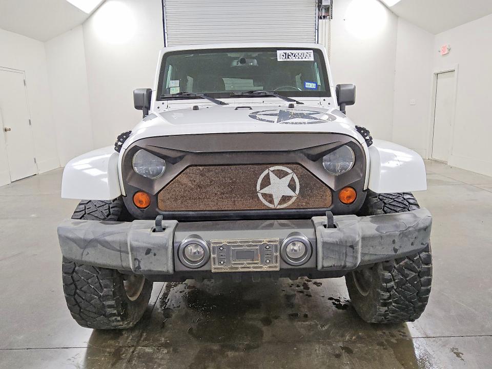 2013 Jeep Wrangler / VIN 1C4BJWDG6DL613986 COPART salvage auction — MINOR DENT/SCRATCHES, Tx - Certificate Of Title, sold $5,200 on 2026-07-09 (photo 5)