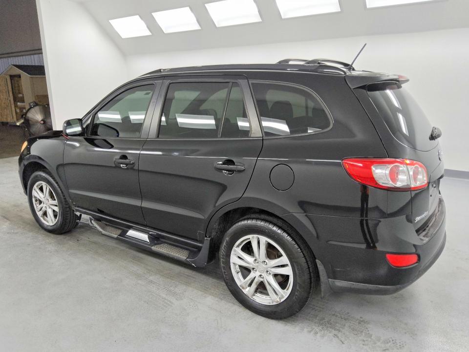 2012 Hyundai Santa fe VIN 5XYZHDAGXCG098374 COPART salvage auction — MECHANICAL, FL - CERTIFICATE OF TITLE, sold $1,750 on 2026-07-02 (photo 2)