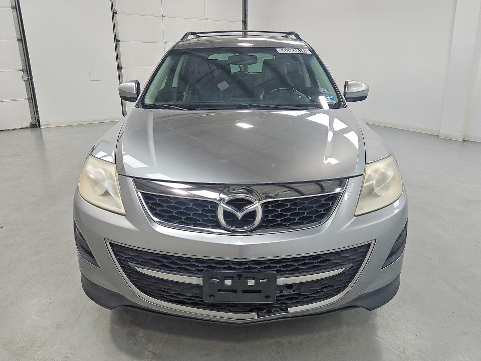 2012 Mazda Cx-9 VIN JM3TB3CV0C0345329 COPART salvage auction — NORMAL WEAR, IN - CERTIFICATE OF TITLE, sold $1,050 on 2026-07-28 (photo 5)