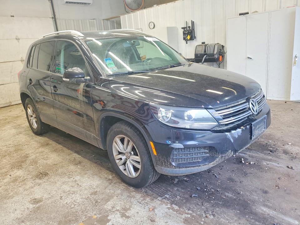 2014 Volkswagen Tiguan VIN WVGBV3AX2EW596073 COPART salvage auction — NORMAL WEAR, ME - CERTIFICATE OF TITLE, sold $350 on 2026-07-02 (photo 4)