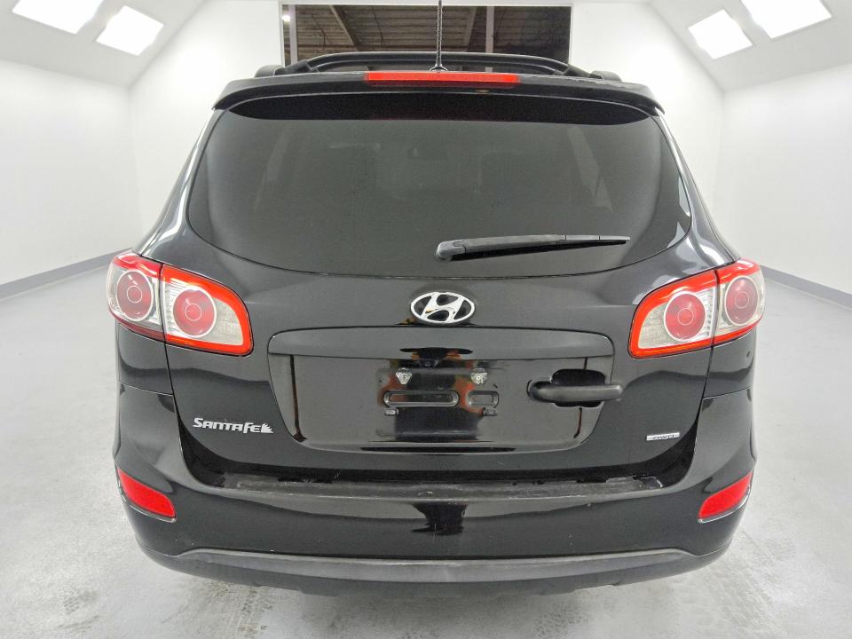 2012 Hyundai Santa fe VIN 5XYZHDAGXCG098374 COPART salvage auction — MECHANICAL, FL - CERTIFICATE OF TITLE, sold $1,750 on 2026-07-02 (photo 6)