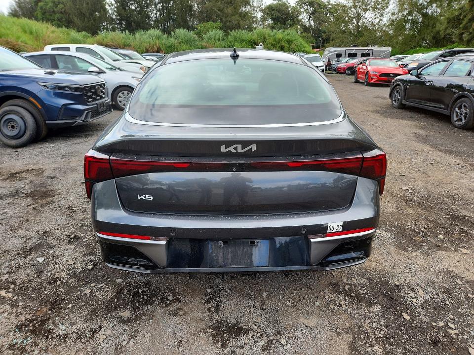 2025 Kia K5 VIN KNAG24J72S5358215 COPART salvage auction — SIDE, Hi - Certificate Of Title, sold $6,400 on 2026-07-06 (photo 6)