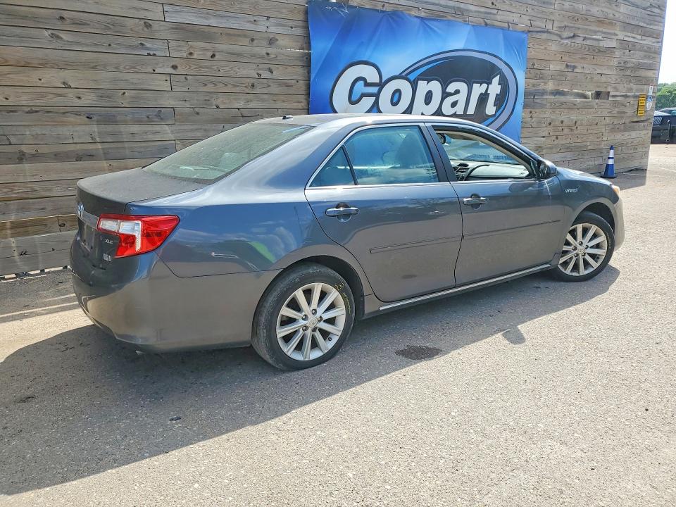 2012 Toyota Camry sola VIN 4T1BD1FK9CU058421 COPART salvage auction — SIDE, Fl - Certificate Of Title, sold $2,800 on 2026-07-02 (photo 3)