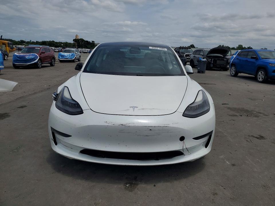2021 Tesla Model 3 VIN 5YJ3E1EA5MF084314 COPART salvage auction — FRONT END, FL - CERT OF TITLE SLVG REBUILDABLE, sold $8,000 on 2026-07-06 (photo 5)
