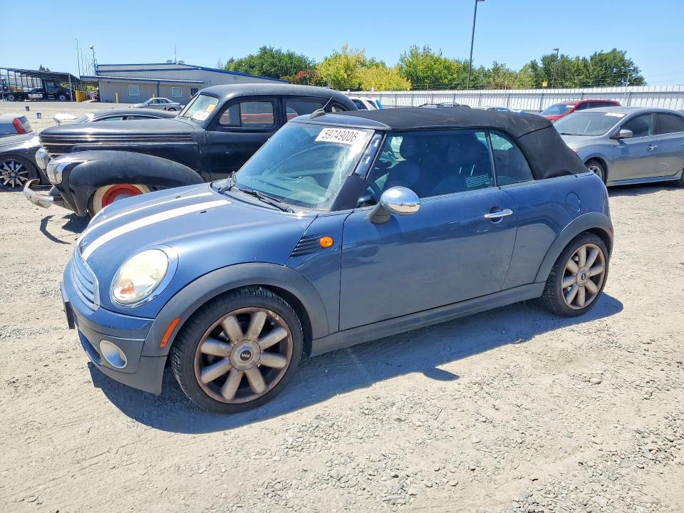 2010 Min Convertibl VIN WMWMR3C50ATZ18781 COPART salvage auction — NORMAL WEAR, DV, sold $300 on 2026-07-14 (photo 1)