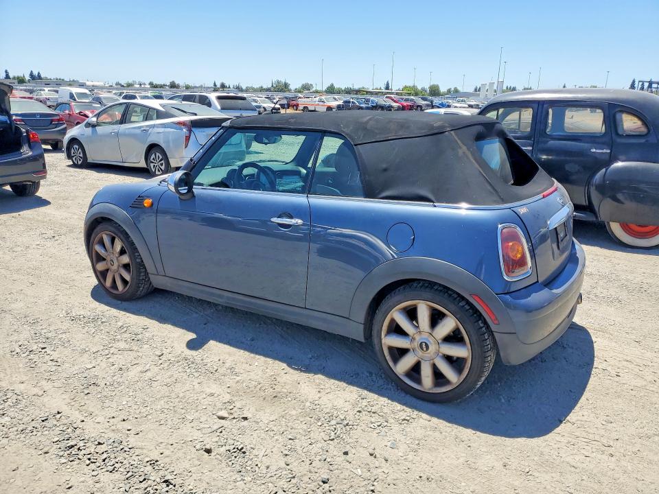 2010 Min Convertibl VIN WMWMR3C50ATZ18781 COPART salvage auction — NORMAL WEAR, DV, sold $300 on 2026-07-14 (photo 2)