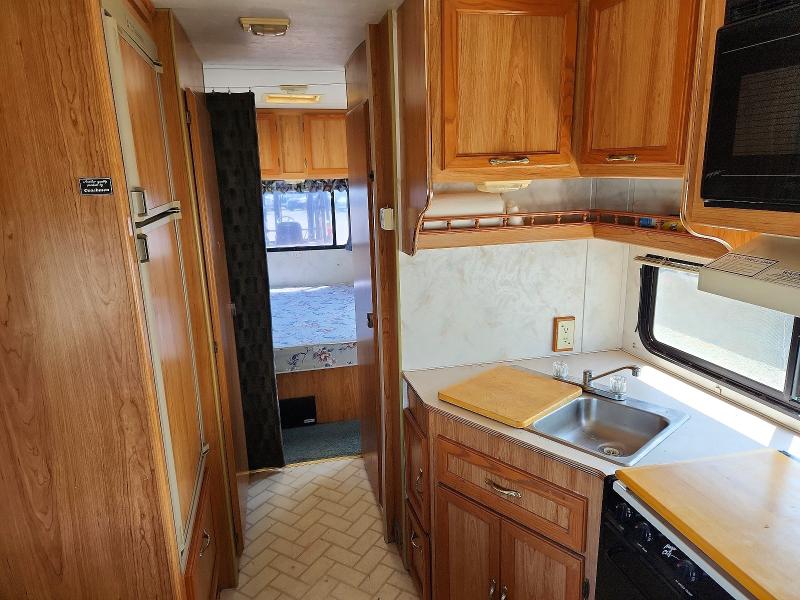 1997 Coach VIN 1FDLE40S8VHB01508 COPART salvage auction — MINOR DENT/SCRATCHES, Ca - Dis/Dlr/Exp Only Clean Title, sold $4,850 on 2026-07-21 (photo 6)