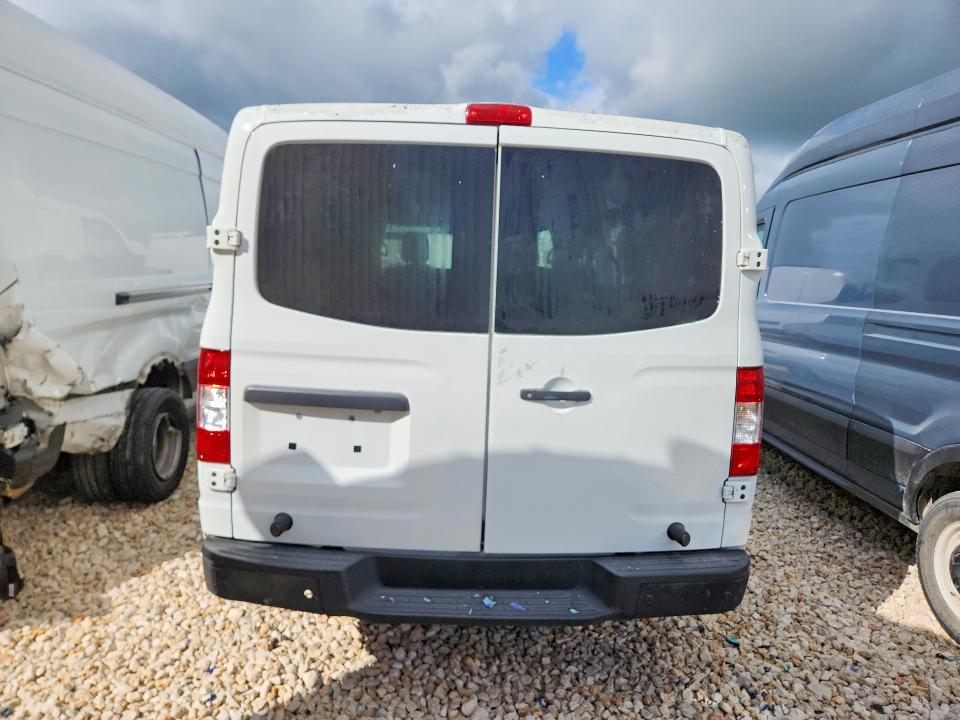 2018 Niss Nv VIN 1N6BF0KM7JN815059 COPART salvage auction — FRONT END, TX - SALVAGE VEHICLE TITLE, sold $325 on 2026-07-09 (photo 6)