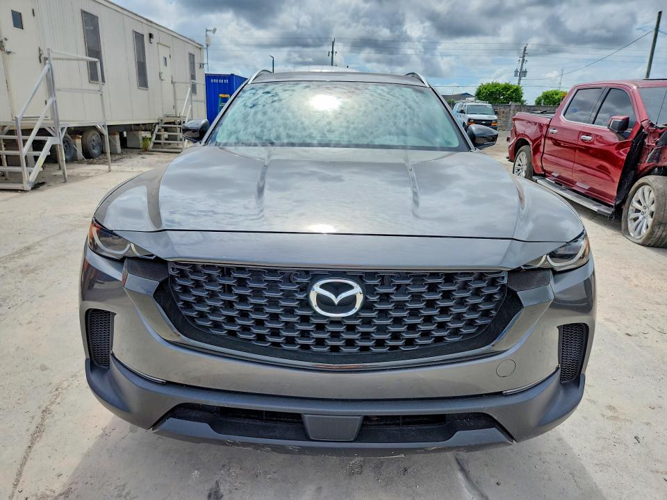 2025 Mazda Cx-50 VIN 7MMVABBM4SN310205 COPART salvage auction — SIDE, Fl - Certificate Of Title, sold $16,400 on 2026-07-02 (photo 5)