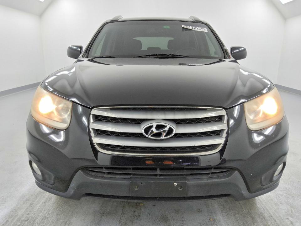 2012 Hyundai Santa fe VIN 5XYZHDAGXCG098374 COPART salvage auction — MECHANICAL, FL - CERTIFICATE OF TITLE, sold $1,750 on 2026-07-02 (photo 5)