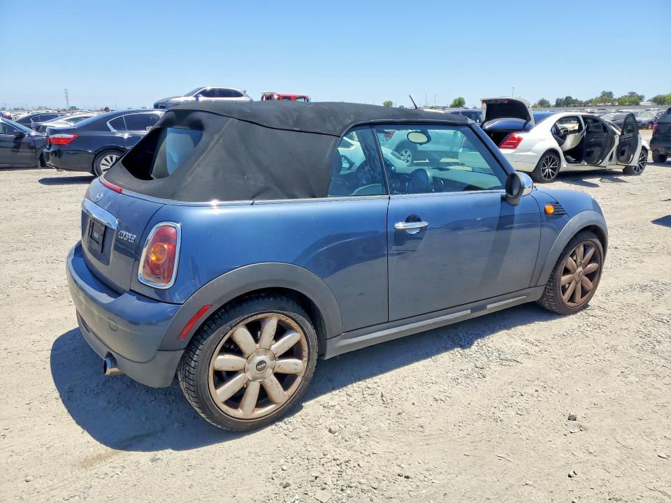2010 Min Convertibl VIN WMWMR3C50ATZ18781 COPART salvage auction — NORMAL WEAR, DV, sold $300 on 2026-07-14 (photo 3)