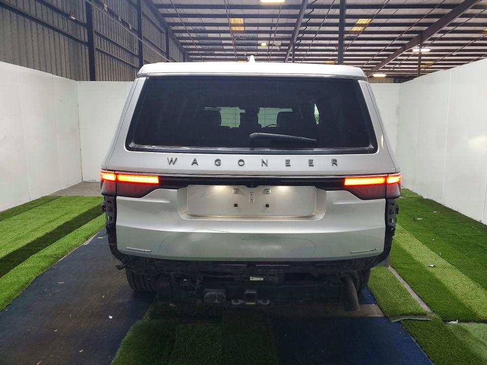2023 Jeep Wagoneer VIN 1C4SJSBP7PS557305 COPART salvage auction — REAR END, TX - CERTIFICATE OF TITLE (P), sold $19,000 on 2026-07-22 (photo 6)
