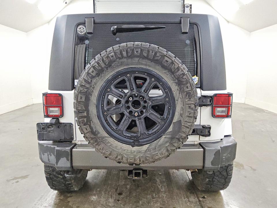 2013 Jeep Wrangler / VIN 1C4BJWDG6DL613986 COPART salvage auction — MINOR DENT/SCRATCHES, Tx - Certificate Of Title, sold $5,200 on 2026-07-09 (photo 6)