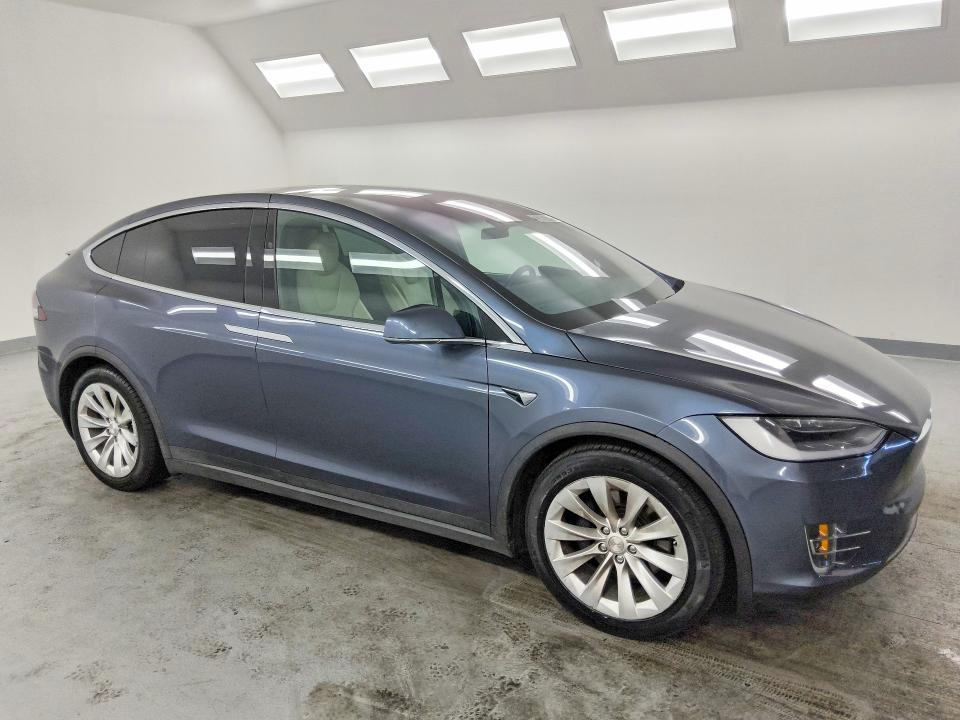 2020 Tesla Model x VIN 5YJXCDE29LF241410 COPART salvage auction — NORMAL WEAR, Ca - Certificate Of Title, sold $31,000 on 2026-07-02 (photo 4)