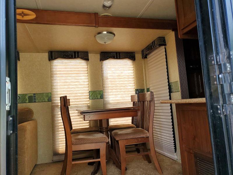 2011 Rockwood Trailer VIN 4X4TRLF28B1839057 COPART salvage auction — ALL OVER, NY - MV-907A SALVAGE CERTIFICATE, sold $1,000 on 2026-07-23 (photo 6)