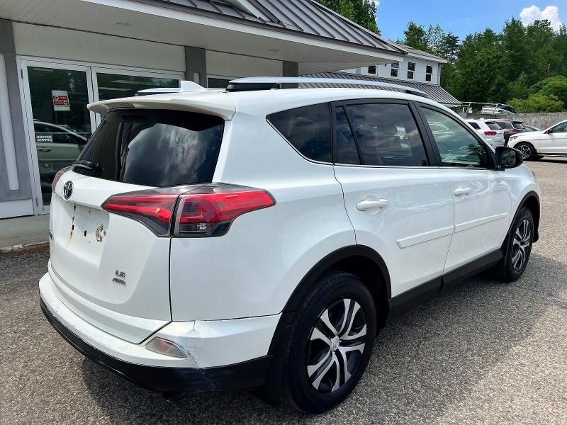 2016 Toyota Rav4 VIN JTMBFREV0GJ100071 COPART salvage auction — MINOR DENT/SCRATCHES, NY - CERTIFICATE OF TITLE (P), sold $6,200 on 2026-07-09 (photo 4)