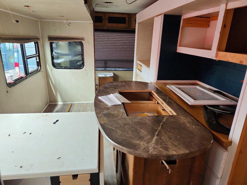 2014 Keystone Sprinter VIN 4YDT33126E1531577 COPART salvage auction — WATER/FLOOD, IN - CERT OF TITLE-SALVAGE FLOOD (P), sold $800 on 2026-07-30 (photo 7)