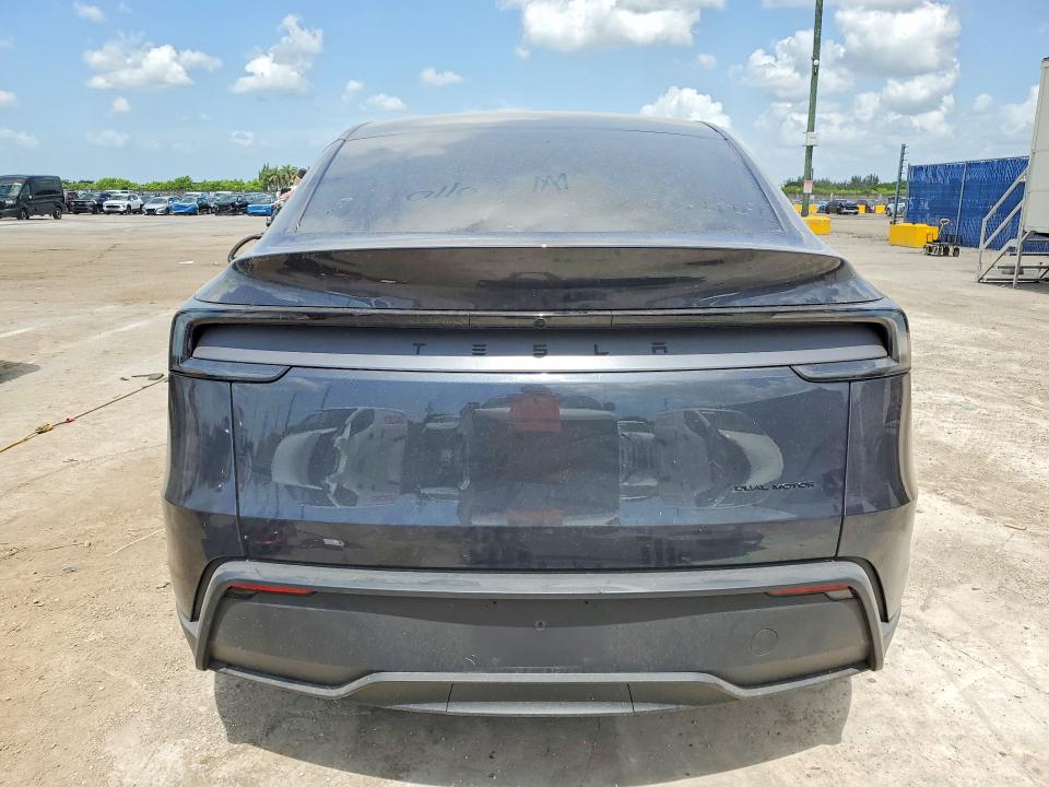 2026 Tesla Model y VIN 7SAYGDEE7TA635782 COPART salvage auction — SIDE, Fl - Cert Of Title Slvg Rebuildable, sold $5,700 on 2026-07-23 (photo 6)