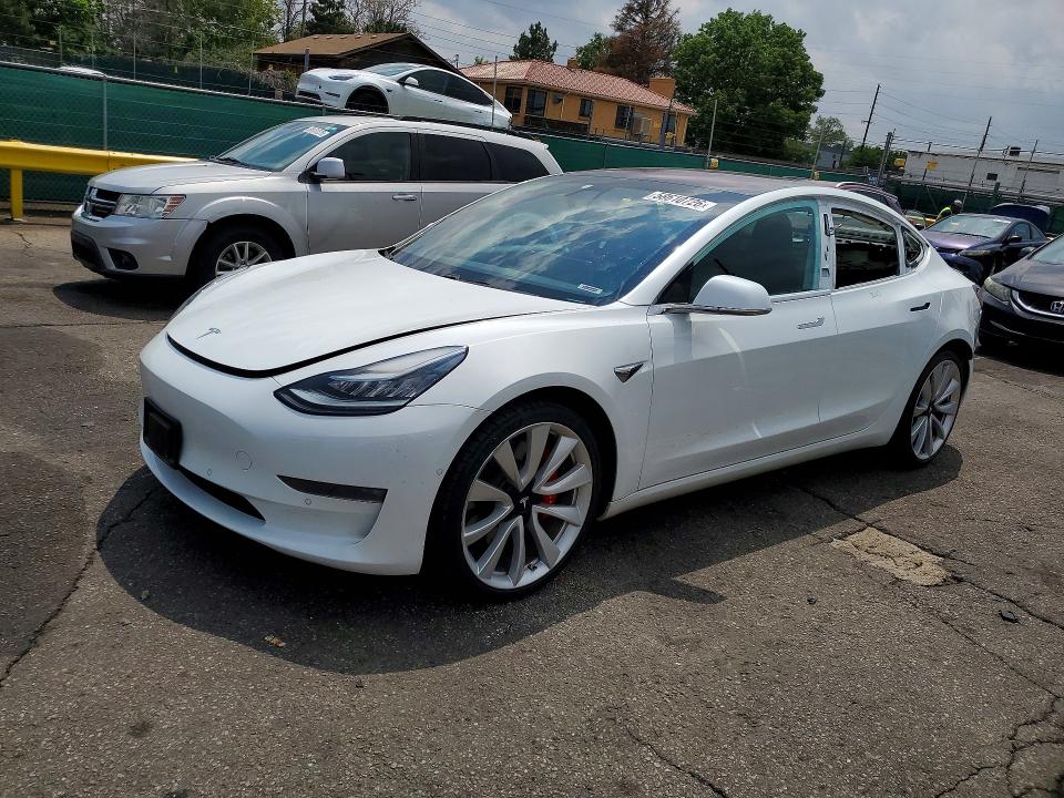 2018 Tesla Model 3 VIN 5YJ3E1EB5JF151501 COPART salvage auction — SIDE, Co - Public - Salvage Title, sold $8,500 on 2026-08-04 (photo 1)