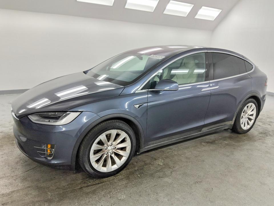 2020 Tesla Model x VIN 5YJXCDE29LF241410 — COPART salvage auction photo