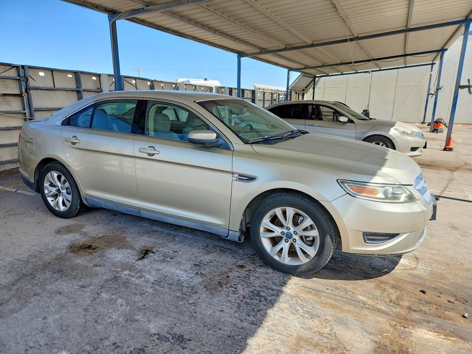 2010 Ford Taurus VIN 1FAHP2EWXAG169447 COPART salvage auction — HAIL, Tx - Certificate Of Title (P), sold $475 on 2026-07-08 (photo 4)