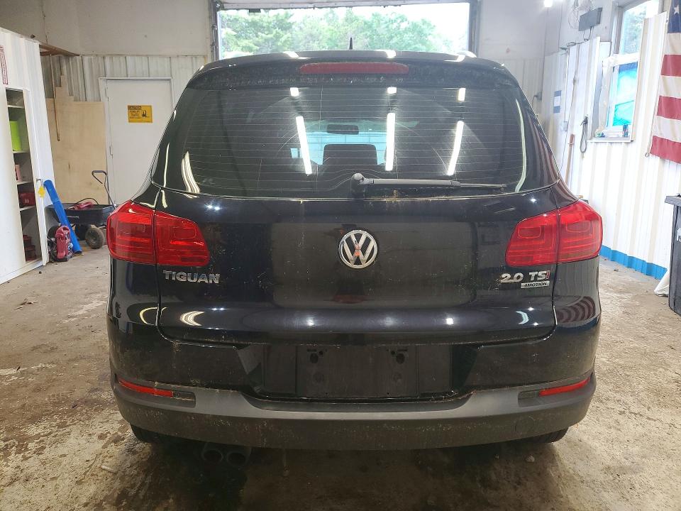 2014 Volkswagen Tiguan VIN WVGBV3AX2EW596073 COPART salvage auction — NORMAL WEAR, ME - CERTIFICATE OF TITLE, sold $350 on 2026-07-02 (photo 6)