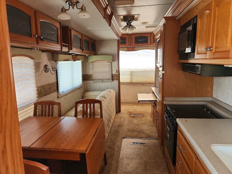 2006 Heartland big horn Unknown VIN 5SFGF35226E001118 COPART salvage auction — SIDE, CA - SALVAGE CERTIFICATE, sold $2,100 on 2026-07-09 (photo 6)