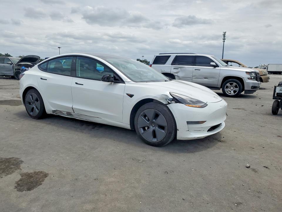 2021 Tesla Model 3 VIN 5YJ3E1EA5MF084314 COPART salvage auction — FRONT END, FL - CERT OF TITLE SLVG REBUILDABLE, sold $8,000 on 2026-07-06 (photo 4)