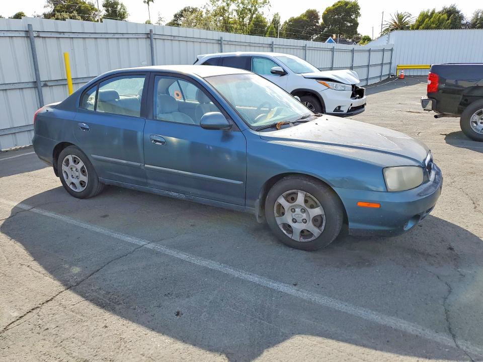2003 Hyundai Elantra VIN KMHDN45DX3U567458 COPART salvage auction — NORMAL WEAR, CA - DIS/DLR/EXP ONLY CLEAN TITLE, sold $350 on 2026-07-17 (photo 4)