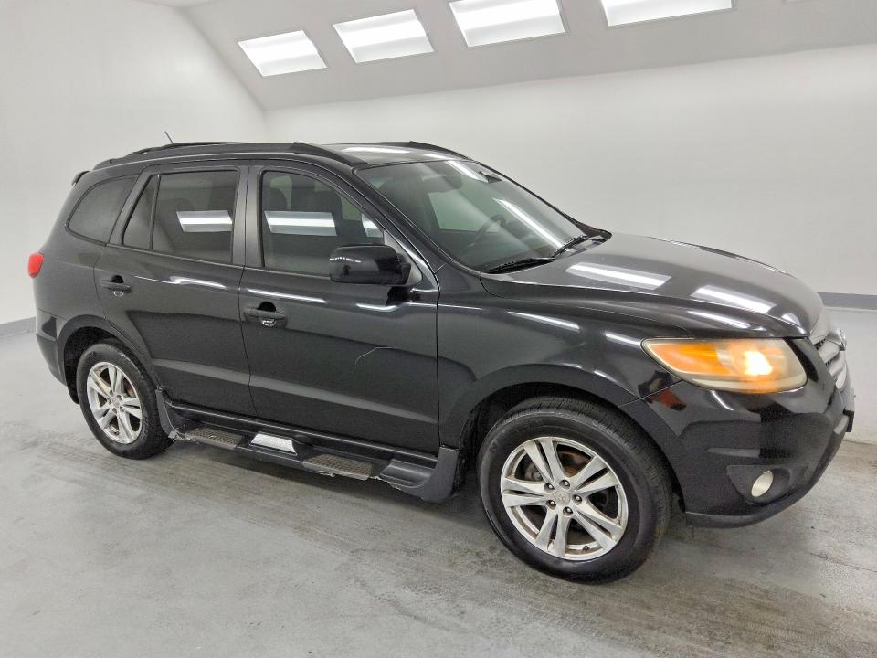 2012 Hyundai Santa fe VIN 5XYZHDAGXCG098374 COPART salvage auction — MECHANICAL, FL - CERTIFICATE OF TITLE, sold $1,750 on 2026-07-02 (photo 4)