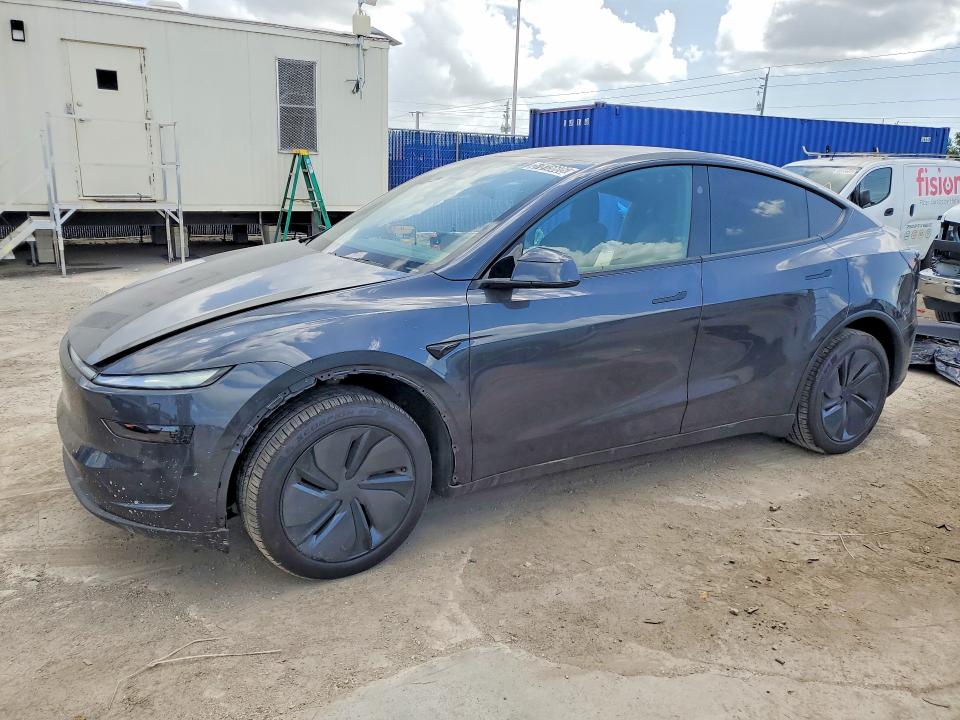 2026 Tesla Model y VIN 7SAYGDEE7TA635782 COPART salvage auction — SIDE, Fl - Cert Of Title Slvg Rebuildable, sold $5,700 on 2026-07-23 (photo 1)