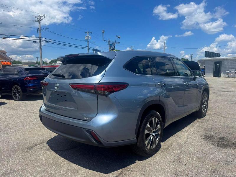 2022 Toyota Highlander VIN 5TDGZRAH0NS123413 COPART salvage auction — NORMAL WEAR, WV - CERTIFICATE OF TITLE (P), sold $22,900 on 2026-07-10 (photo 4)