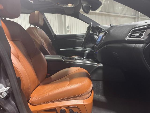 2017 Maserati Ghibli VIN ZAM57XSA9H1206127 COPART salvage auction — NORMAL WEAR, TX - CERT OF TITLE-REBUILT SALVAGE (P), sold $30,250 on 2024-08-15 (photo 5)