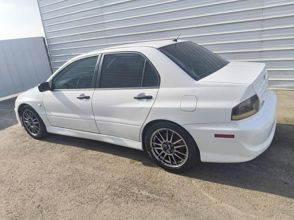 2005 Mitsubishi Evo VIN JA3AH36D75U044942 COPART salvage auction — MECHANICAL, CA - CERTIFICATE OF TITLE, sold $20,500 on 2026-08-20 (photo 2)
