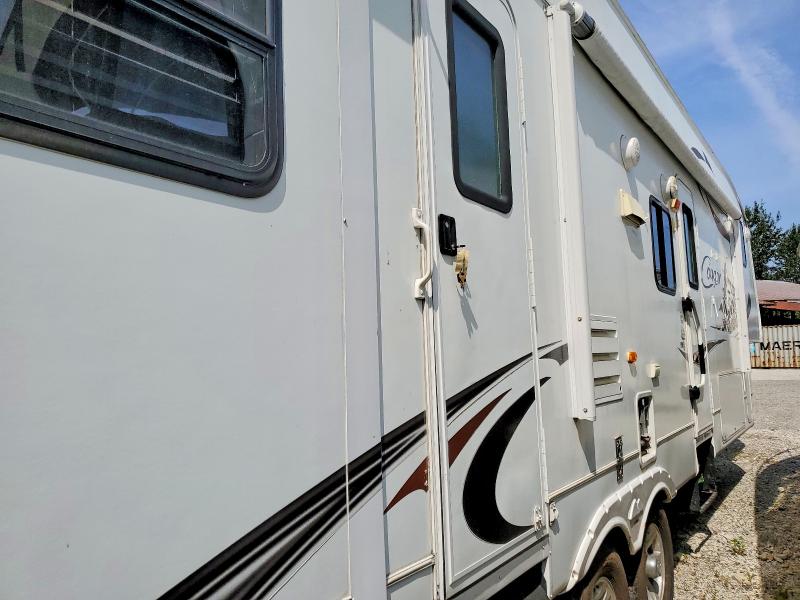 2010 Cougar Keystone VIN 4YDF32424A2502117 COPART salvage auction — NORMAL WEAR, AB - OOP - ACTIVE, sold $200 on 2026-07-28 (photo 4)