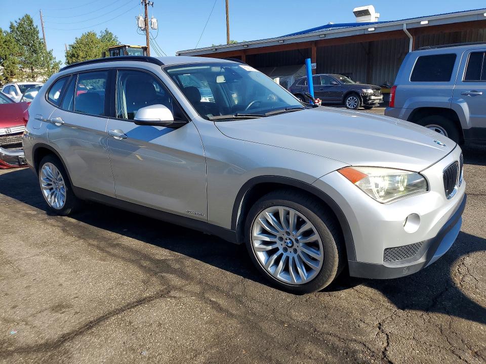 2014 BMW X1 VIN WBAVM1C56EVW50790 COPART salvage auction — MINOR DENT/SCRATCHES, Mt - Dis/Dlr/Exp Only Clean Title, sold $3,150 on 2026-08-04 (photo 4)