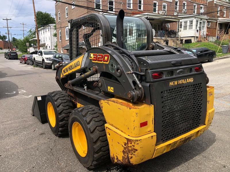 2023 New holland L230 VIN JAF0L320TPM452065 COPART salvage auction — NORMAL WEAR, BS, sold $27,750 on 2026-07-29 (photo 4)