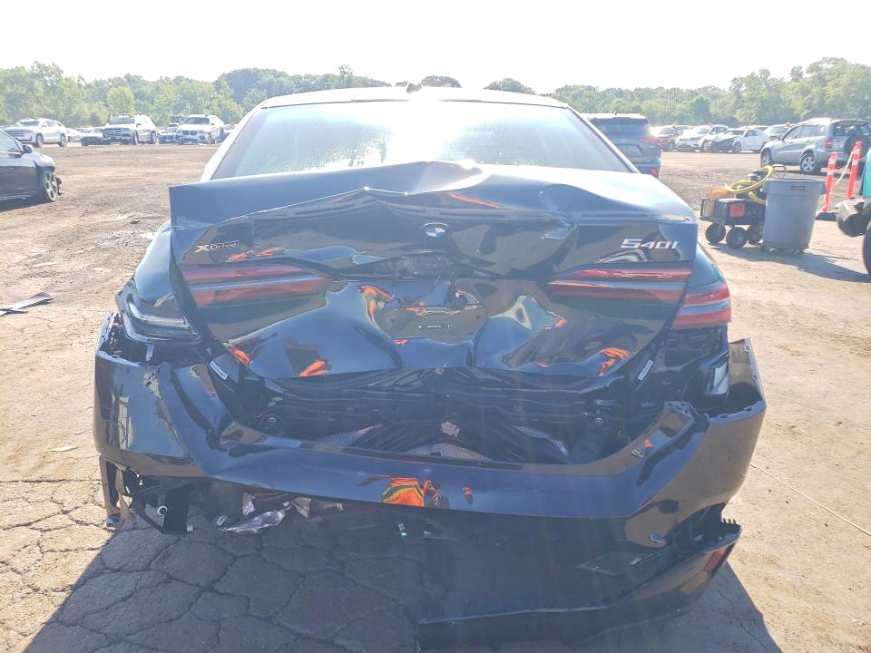 2026 BMW 5 series VIN WBA63FJ0XTCW18963 COPART salvage auction — REAR END, CT - CERT OF TITLE-SALVAGE, sold $34,500 on 2026-08-21 (photo 6)