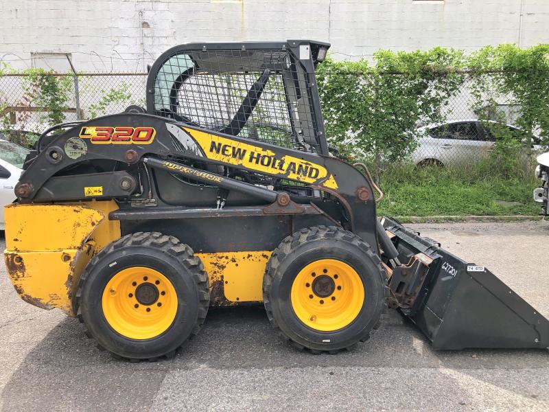 2023 New holland L230 VIN JAF0L320TPM452065 COPART salvage auction — NORMAL WEAR, BS, sold $27,750 on 2026-07-29 (photo 7)