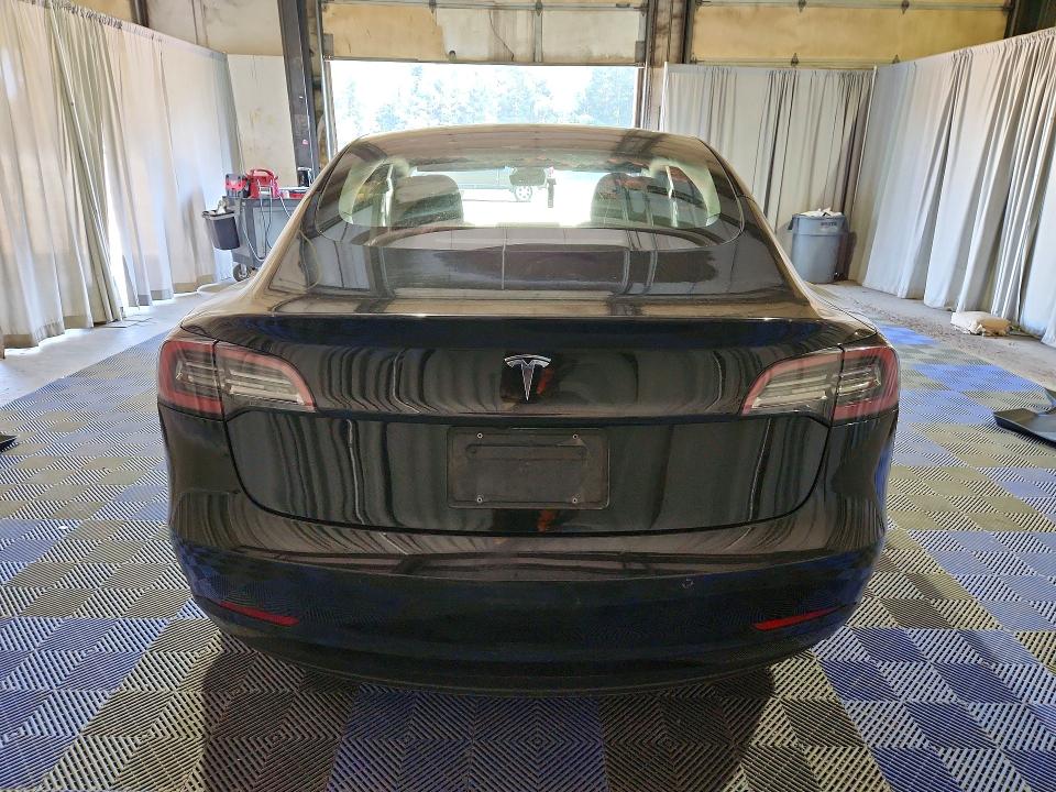 2022 Tesla Model 3 VIN 5YJ3E1EA1NF304663 COPART salvage auction — SIDE, Wa - Vehicle Cert Of Ownership-Titl, sold $6,100 on 2026-08-03 (photo 6)