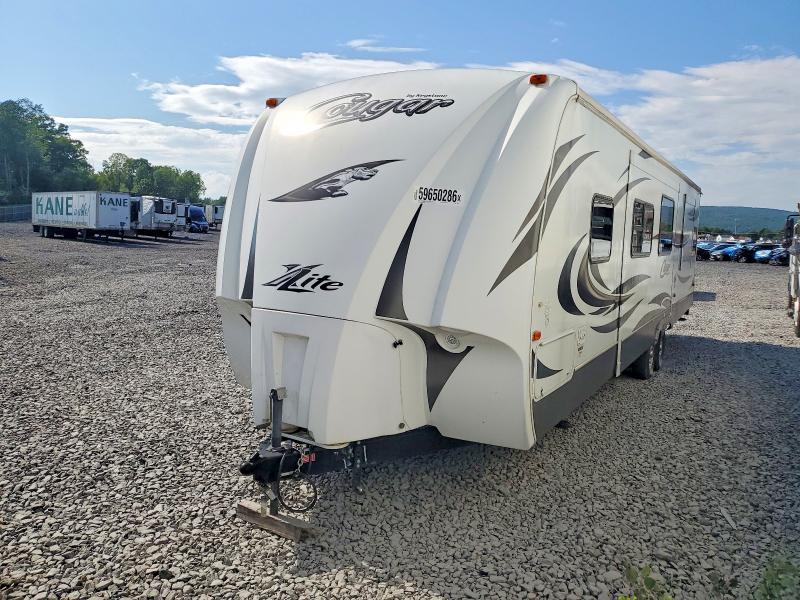 2012 Cougar Trav trail VIN 4YDT31S25CV503441 COPART salvage auction — REAR END, PA - CERTIFICATE OF SALVAGE, sold $1,700 on 2026-07-23 (photo 2)
