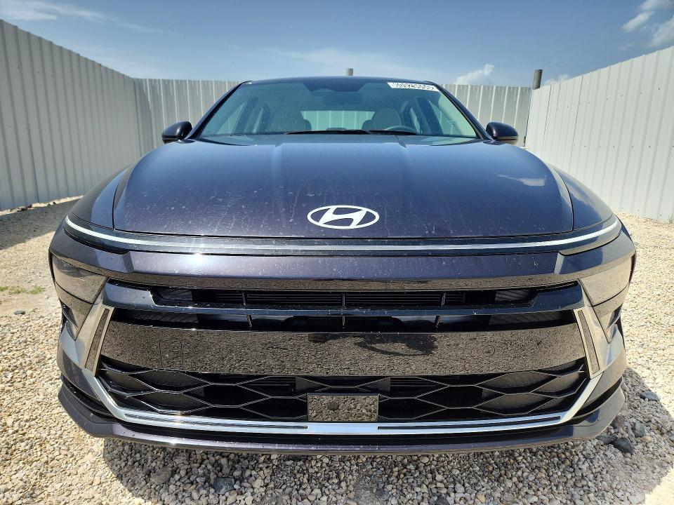 2025 Hyundai Sonata VIN KMHL64JA7SA497776 COPART salvage auction — WATER/FLOOD, Fl - Cert Of Title-Slvg Rebld Flood (P), sold $11,600 on 2026-07-27 (photo 5)