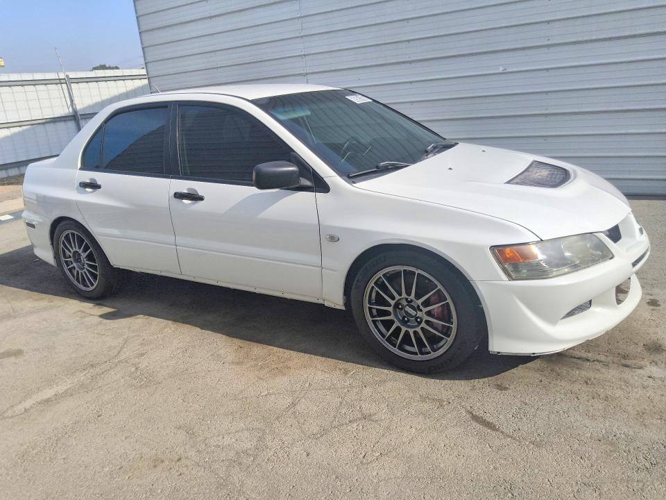 2005 Mitsubishi Evo VIN JA3AH36D75U044942 COPART salvage auction — MECHANICAL, CA - CERTIFICATE OF TITLE, sold $20,500 on 2026-08-20 (photo 4)
