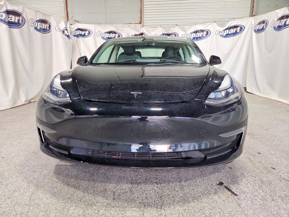 2022 Tesla Model 3 VIN 5YJ3E1EA0NF369004 COPART salvage auction — MECHANICAL, Fl - Certificate Of Title, sold $8,100 on 2026-08-03 (photo 5)