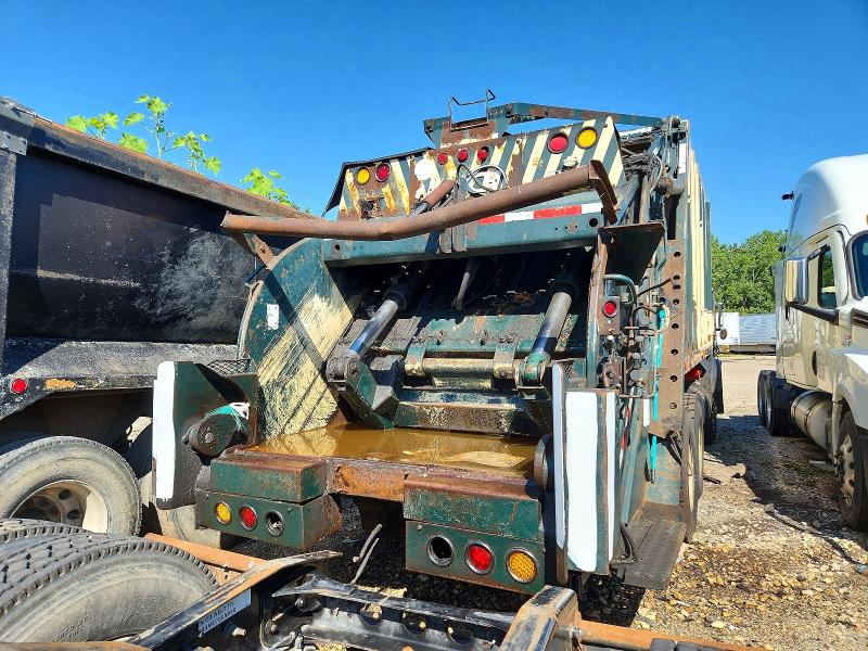 2004 Mack All other VIN 1M2AC07C04M009948 COPART salvage auction — MINOR DENT/SCRATCHES, FL - CERTIFICATE OF DESTRUCTION, sold $450 on 2026-07-30 (photo 4)