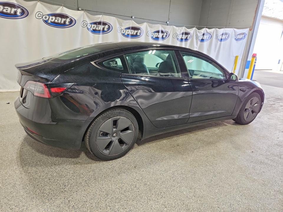 2022 Tesla Model 3 VIN 5YJ3E1EA0NF369004 COPART salvage auction — MECHANICAL, Fl - Certificate Of Title, sold $8,100 on 2026-08-03 (photo 3)
